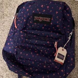 JanSport Blue Backpack with Pink Palm Design